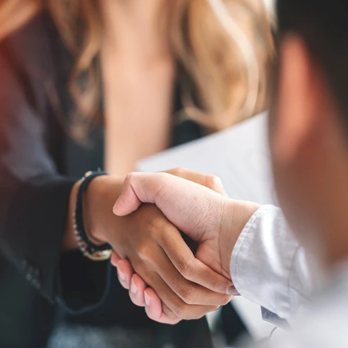 Chiropractic Duluth GA Doctor and Client Shaking Hands